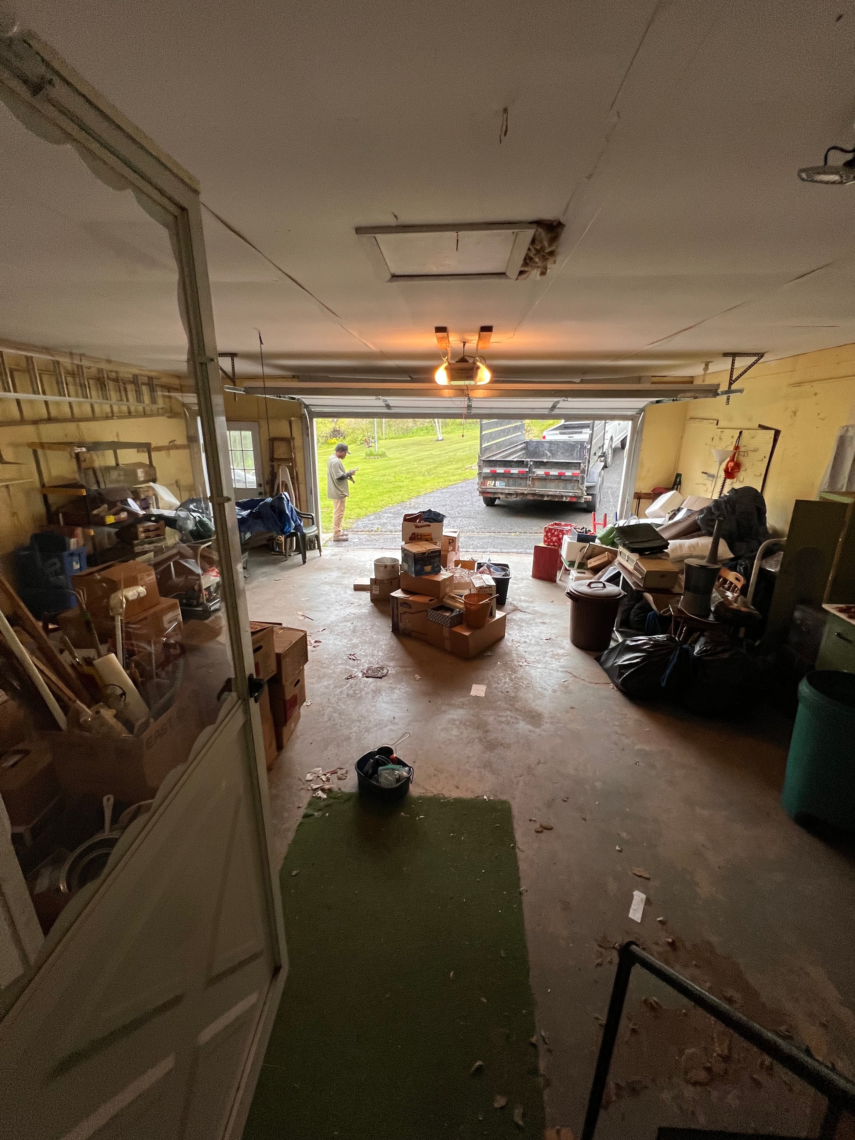 Cluttered basement before cleanout