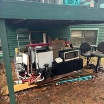Garage full of junk before removal